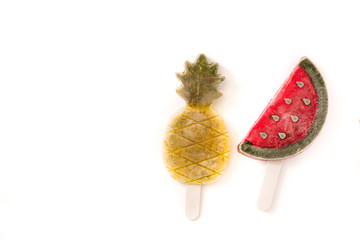 Pineapple and watermelon popsicles isolated on white background. Copyspace.Top view

