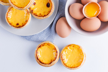 Top view of egg tart with egg. Portugal Egg Tart
