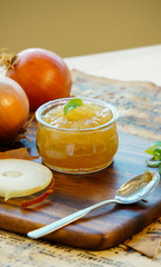 onion marmalade (jam) onion confiture on a rustic wood