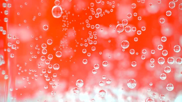 Bubble soda on red Background - 4k