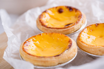 Closeup of egg tart on wood table