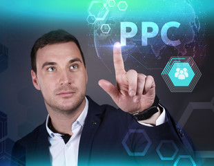 Business, Technology, Internet and network concept. Young businessman working on a virtual screen of the future and sees the inscription: PPC