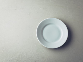 Empty Plate on concrete background