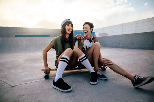Urban girls enjoying in skate park