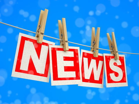 Wooden clothespins on rope with News. Image with clipping path