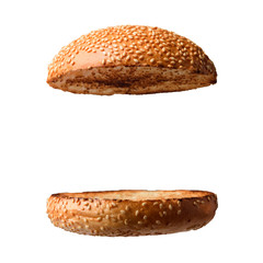 two halves of a burger burger grilled on a white background