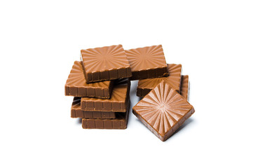 Chocolate pieces isolated on white background