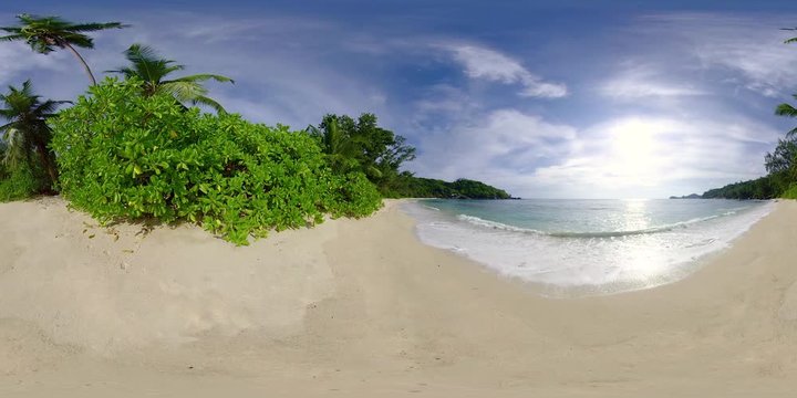 360 degree view 4k video sand beach and tropical sea on seychelles island on sunny vacation day, recorded in 8K
