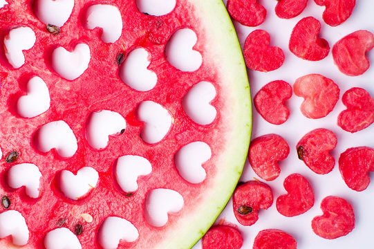 Watermelon fruit with heart shaped cut outs
