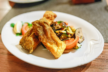 carp for traditional czech christmas eve on a plate in restaurant