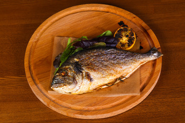 Grilled dorada with lemon
