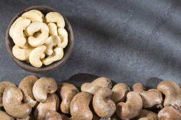 Cashew nut on wooden background - Anacardium occidentale
