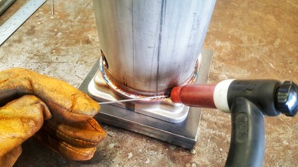 Tig welding stainless steel work.