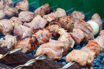 Grilling the marinated pork meat delicious shashlik