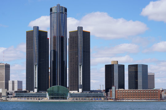 Detroit city center Renaissance Center during a beautiful day view from Windsor, Ontario, Canada.
