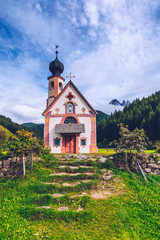 St Magdalena Village Church at the foot of the Dolomites, Church of St. John in Ranui, Alps, Italy
