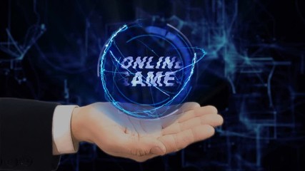 Painted hand shows concept hologram Online Games on his hand. Drawn man in business suit with future technology screen and modern cosmic background
