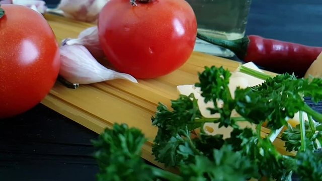 spaghetti, drops parsley garlic slow-motion shot
