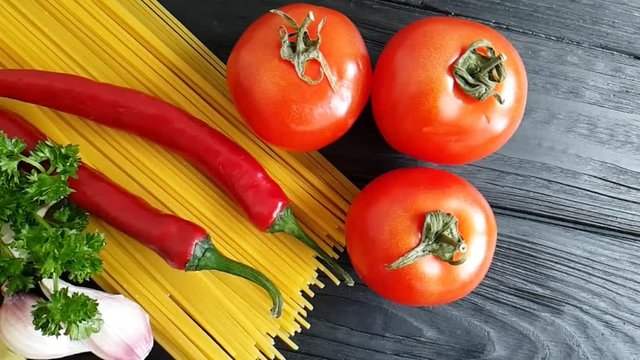 spaghetti, cheese, red pepper, garlic slow-motion shot