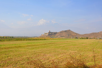 Field in the village of Lusarat. In the distance is the monastery of Khor Virap. Armenia