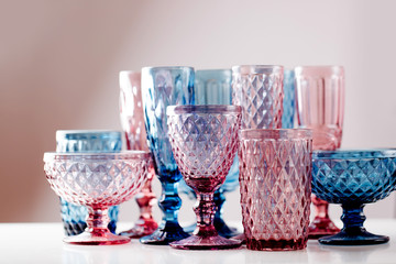 Embossed colored drink glasses for wine and champagne. © igishevamaria
