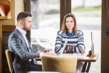 Business couple in cafe