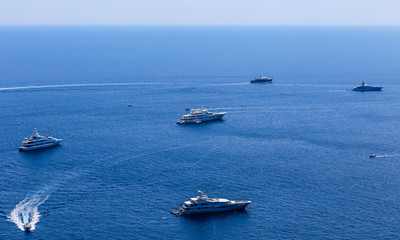 Fototapeta premium Blue sea and leisure boats seen from from Augustus Gardens,Isle of Capri, Italy