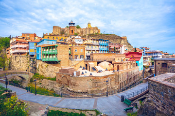 Old sulfur Baths in Abanotubani district with wooden carved balconies in the Old Town of Tbilisi, Georgia - obrazy, fototapety, plakaty
