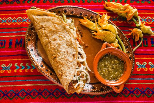mexican quesadillas with squash blossom, cheese and sauce in mexico