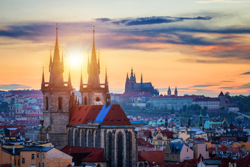 Fototapeta premium Famous Tyn Church on Old Town Square, Prague castle is visible in the background. Prague, Czech Republic