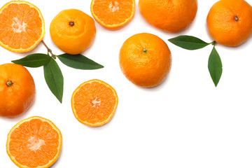 mandarin with slices and green leaf isolated on white background top view