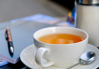 tea cup on cafe table outdoor close up