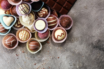 Fototapeta na wymiar a lot of variety chocolate pralines, belgian confectionery gourmet chocolate.