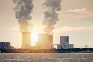 Multiple Coal Fossil Fuel Power Plant Smokestacks Emit Carbon Dioxide Pollution