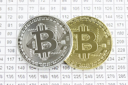 Cryptocurrency Golden and silver Bitcoin. Numeric table