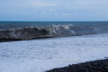 Stormy sea waves breaking near the coast