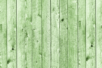 Green flat wooden background of vertical boards