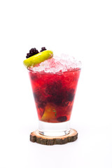 juicy cocktail with blackberry at glass on white background