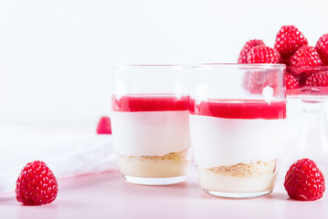 Raspberry dessert from whipped white chocolate mousse and raspbe