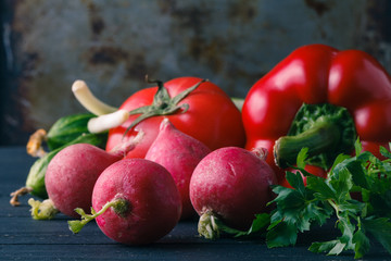 half of radish on the wooden background