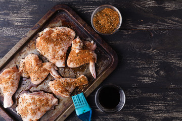 Cooking chicken leg, close up with spices