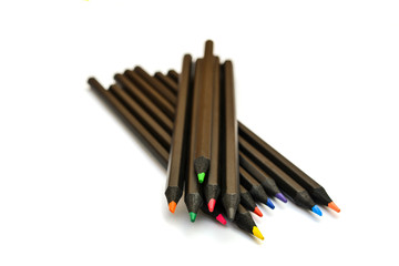 Obraz premium Collection of colorful pens over white background
