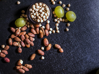 close up raw nuts seeds and fresh fruits