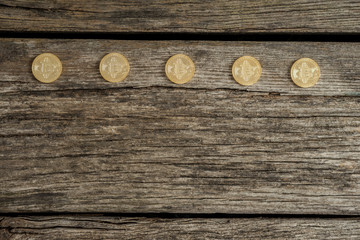 Five golden bitcoins in a row