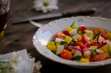 Vegetables salad on a white plate