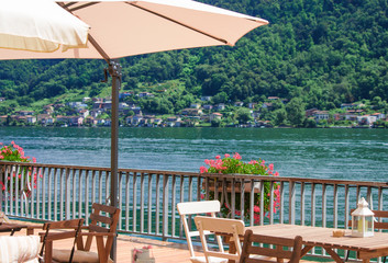 panoramic terrace where you can sip a drink while enjoying the view. Lugano lake, switzerland