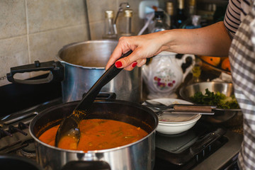 woman hand cooking preparing mexican food homemade in mexico city