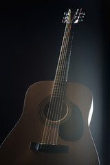 Obraz na płótnie Canvas acoustic guitar on isolated black background