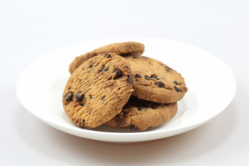 Chocolate chip cookies isolated on white background. Sweet biscuits.
