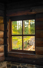 view through window of a wooden cabin
